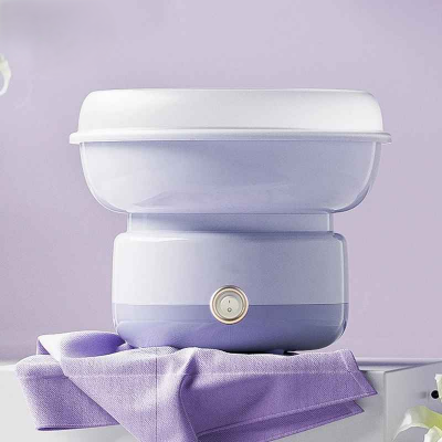 machine a barbe a papa violet sur table