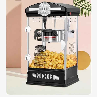 machine a pop corn noire sur table