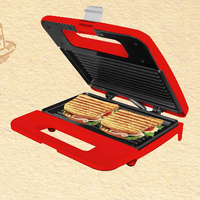 appareil a croque monsieur ouvert avec sandwichs