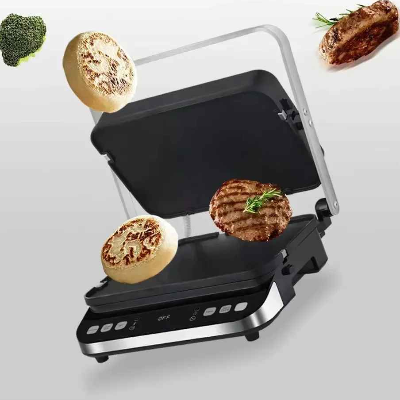 machine a panini avec aliments dans les airs