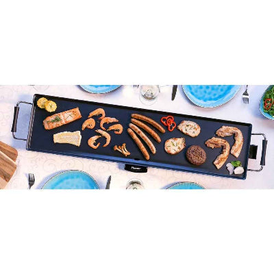 plancha electrique sur table garnie aliments